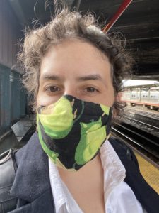 An image of Dorian Gittleman wearing a fabric face mask